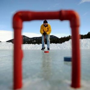 Ron Eccles, Thursday, Feb. 10, 2011, during a round of Ice Croquet on Evergreen Lake in Evergreen. RJ Sangosti, The Denver Post